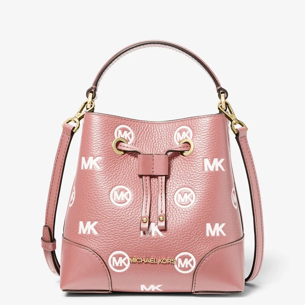MICHAEL KORS
Mercer Small Logo Embossed Leather Bucket Bag
COLOR PRIMROSE 
NWT - Picture 2 of 4